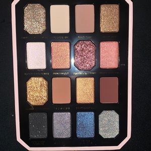 New,never been used Too Faces Pretty Rich palette